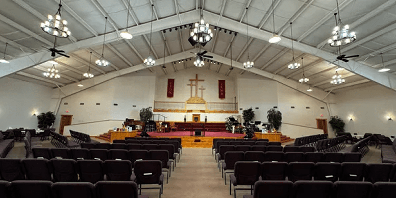 Empty church sanctuary with altar and chairs