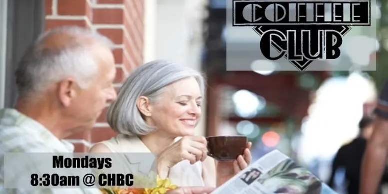 Seniors reading with coffee cup